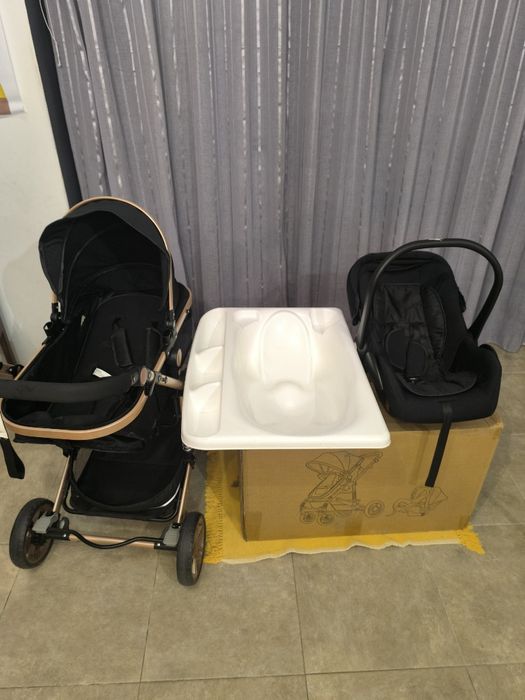 Carrinho de bebê como novo 3 em 1 + banheira e muda fraldas.