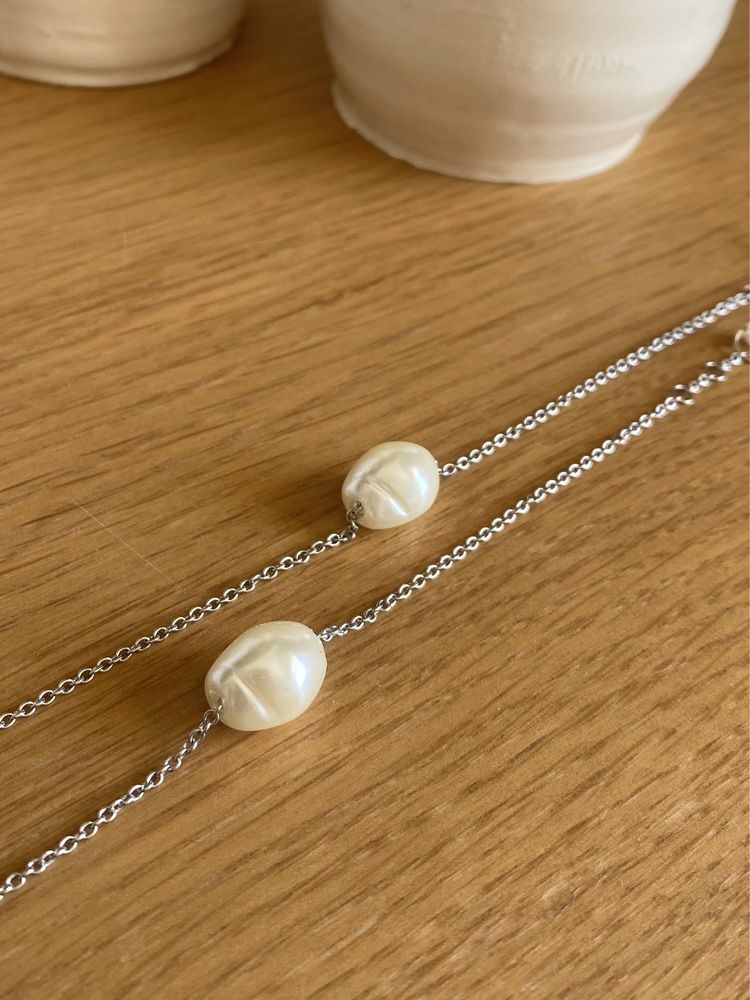 Pulseira prateada com perola
