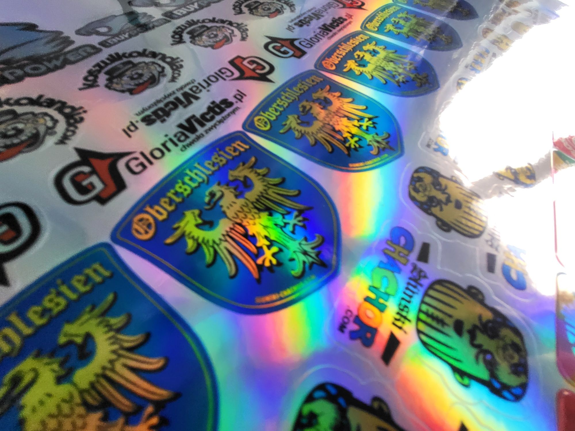 Naklejki holograficzne twoje logo wycięte po konturze max 6x6cm -20szt