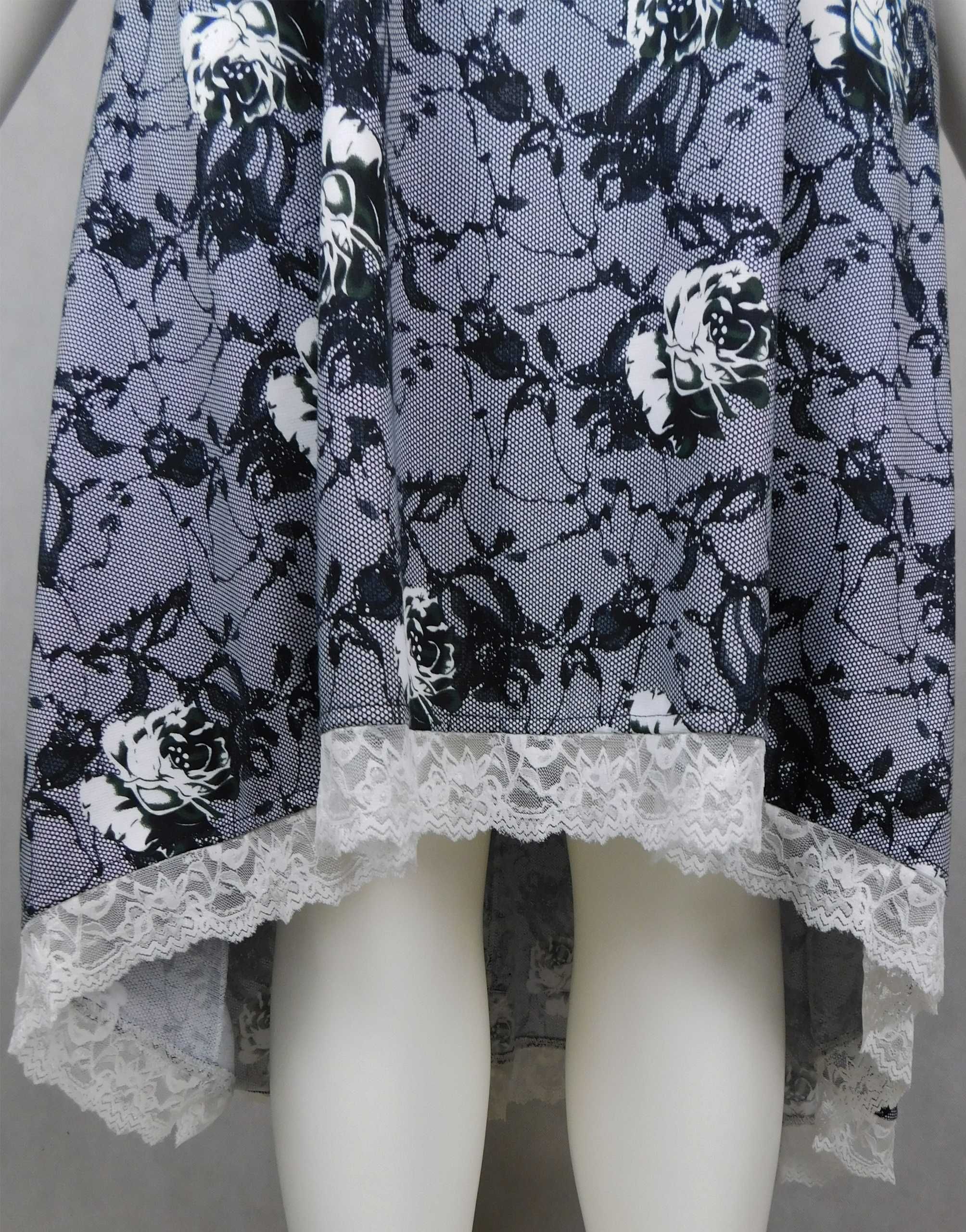 Sukienka elegancka z kieszeniami imitacja koronki XXXL - 60/62