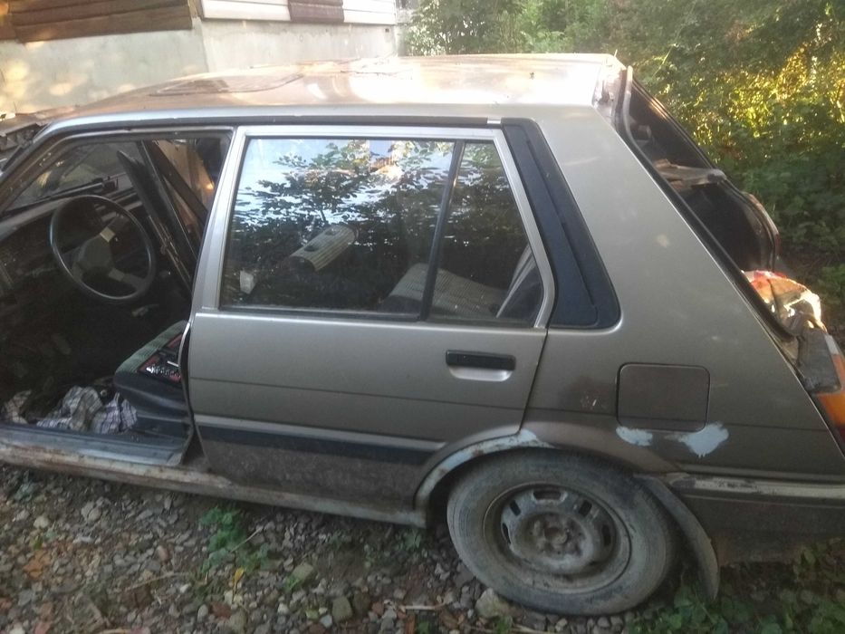 Двері Toyota Corolla e80