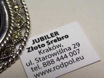 Srebrna zawieszka owalny onyks ażurowa ramka z markazytami