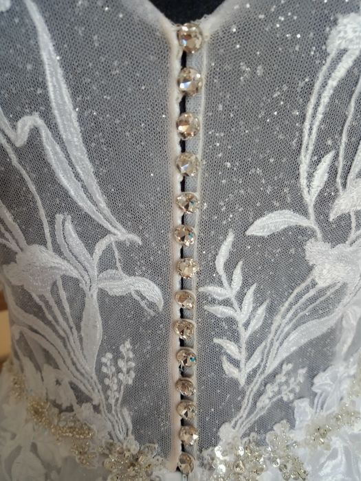 Suknia ślubna biała z brokatem szyta na miarę