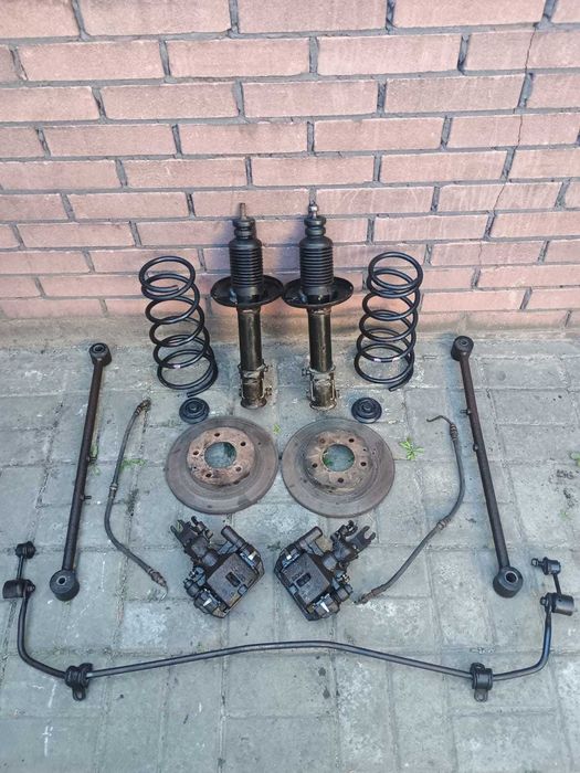 Стабілізатор задній,важіль,супорт пружина стойка Mazda 626 ge