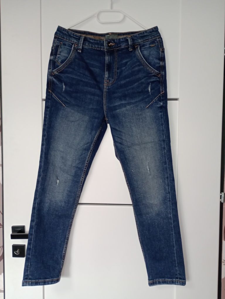 Jeansy Zara z przetarciami rozmiar 38