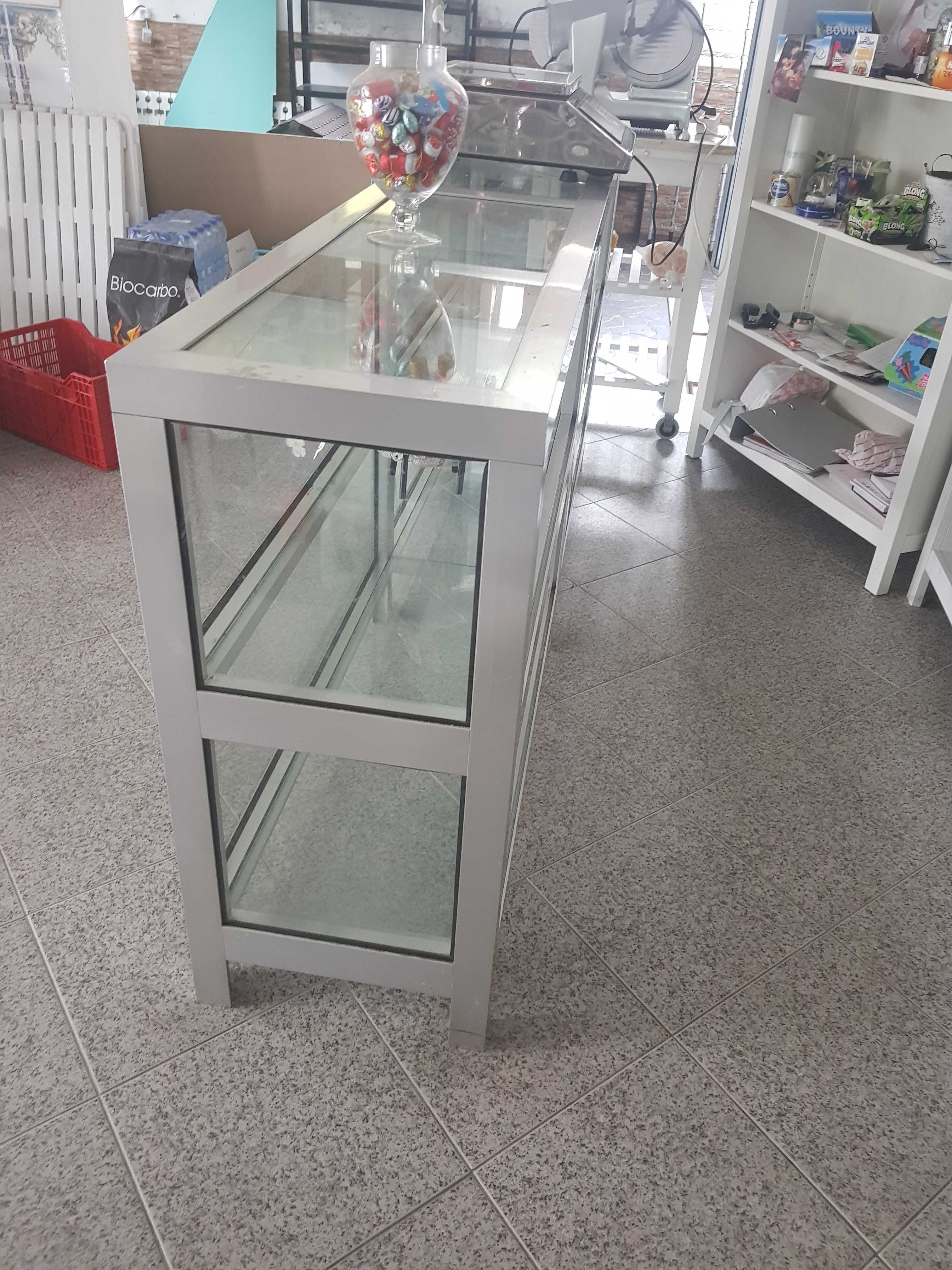 balcao de loja em inox e vidro