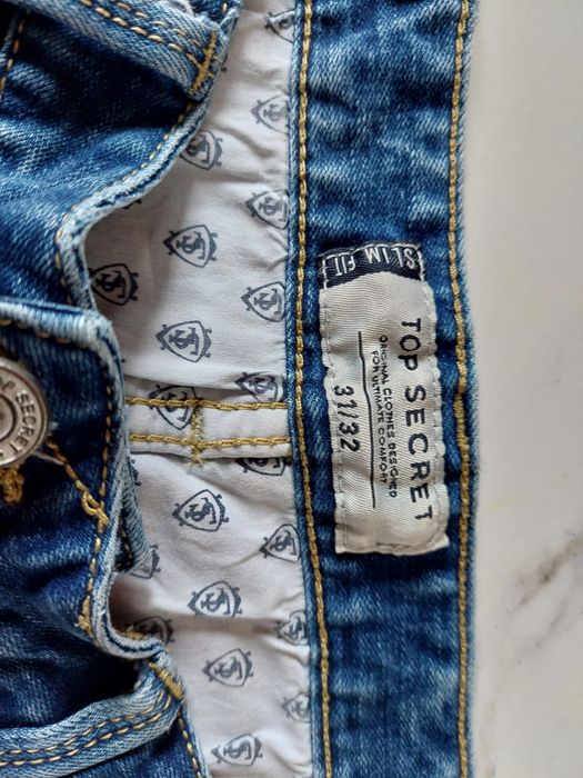 Spodnie jeansowe dziury Top Secret rozm. 38