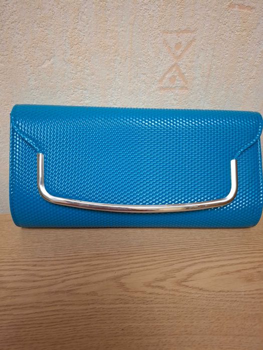 Сумка-клатч бирюзового цвета