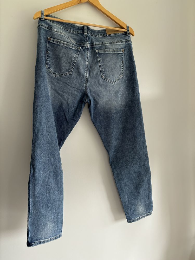 Reserved Granatowe jeansy dziury przetarcia 42 XL rurki skinny