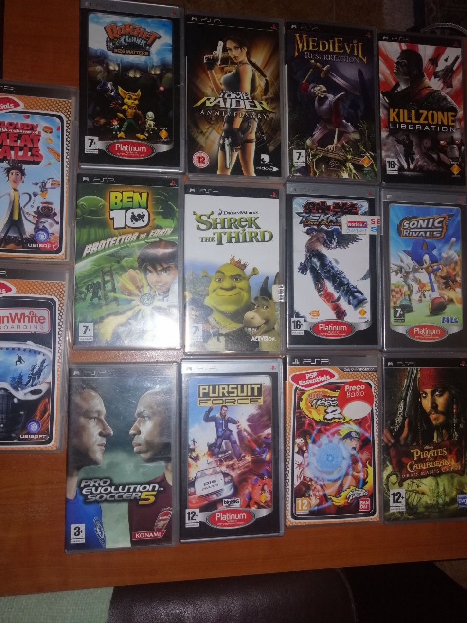 14 jogos como novos da PSP só entereçados.