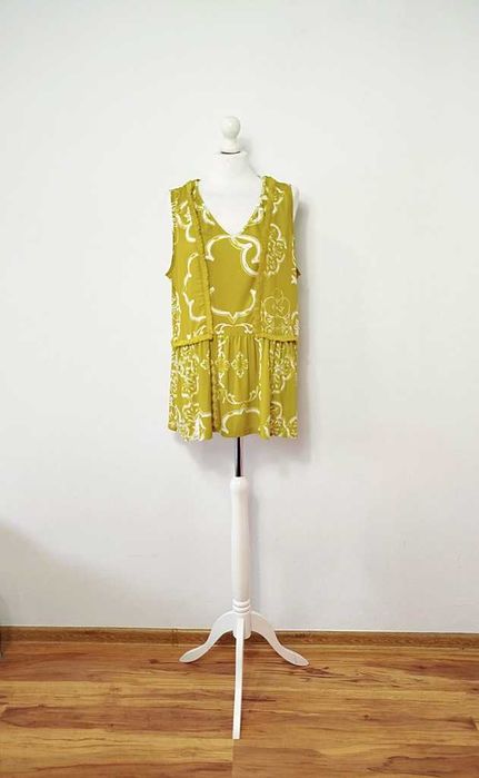 Next limonkowa bluzka z frędzelkami falbanka