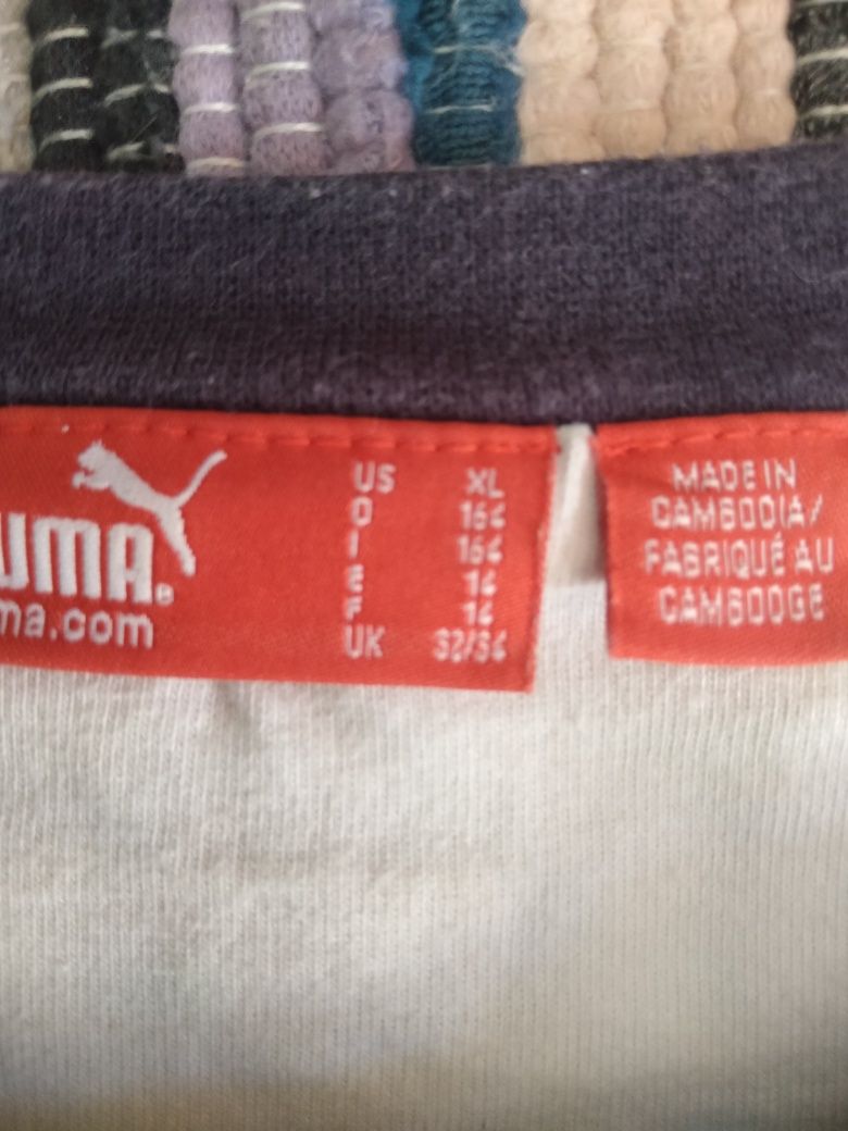 4 blusas sem mangas Puma vestidas 1 vez. N°14 anos.