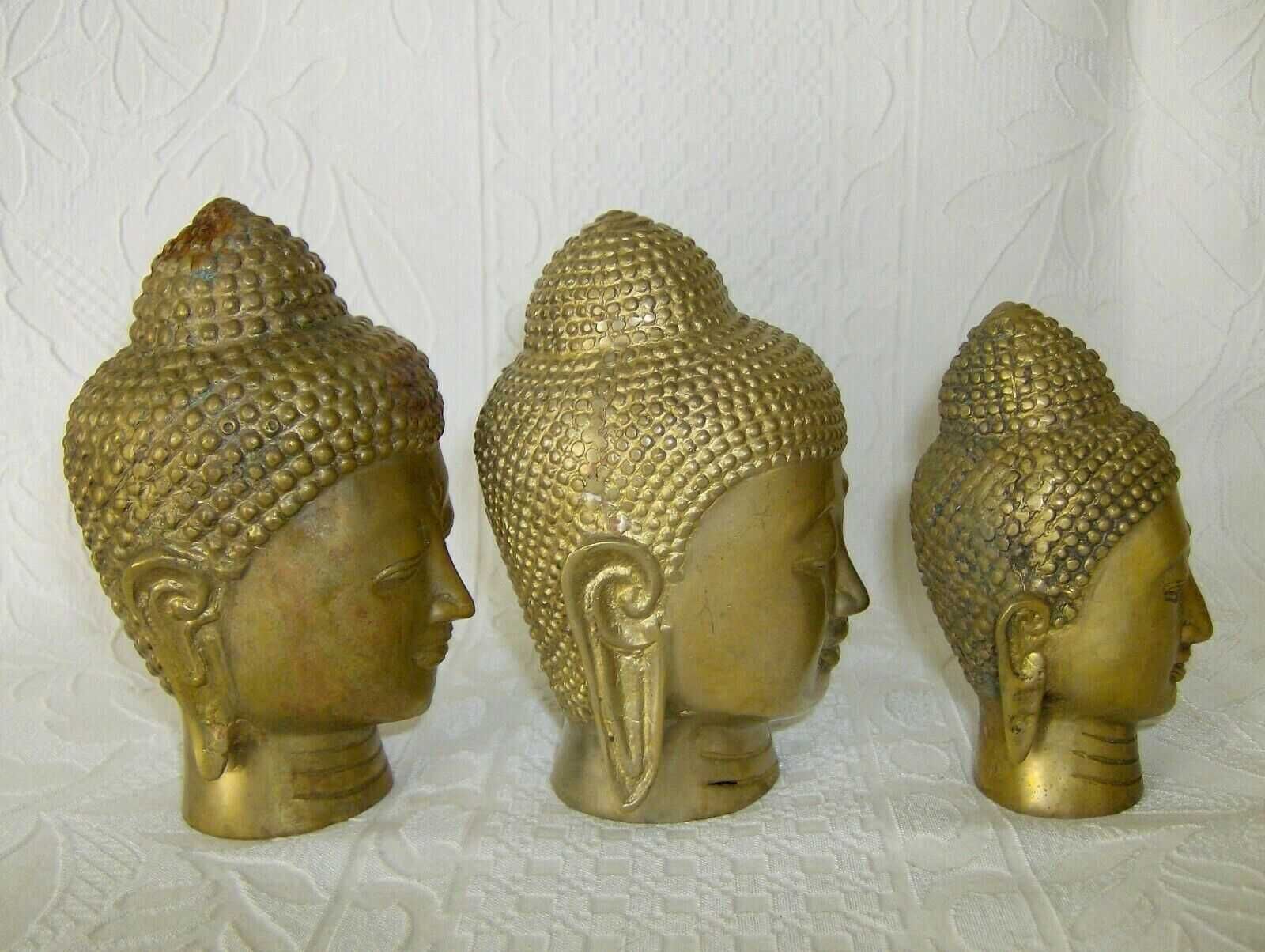 3 cabeças de Buda  em Latão