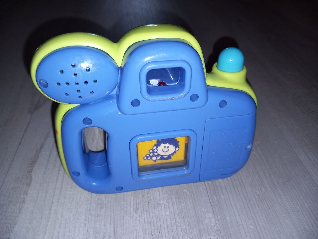 Zabawkowy aparat dla dzieci, z przeskakujacymi obrazkami