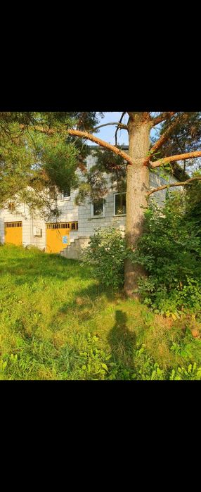 Działka budowlana 2300 m2 z z budynkiem gospodarczym z dwoma garażami