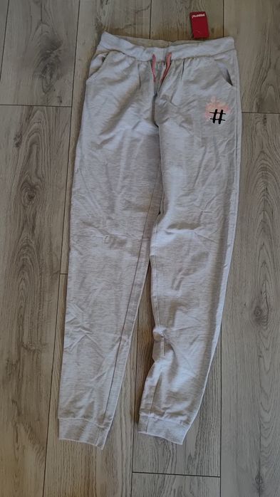 Sprzedam spodnie dresowe dziewczęce  roz 158/164