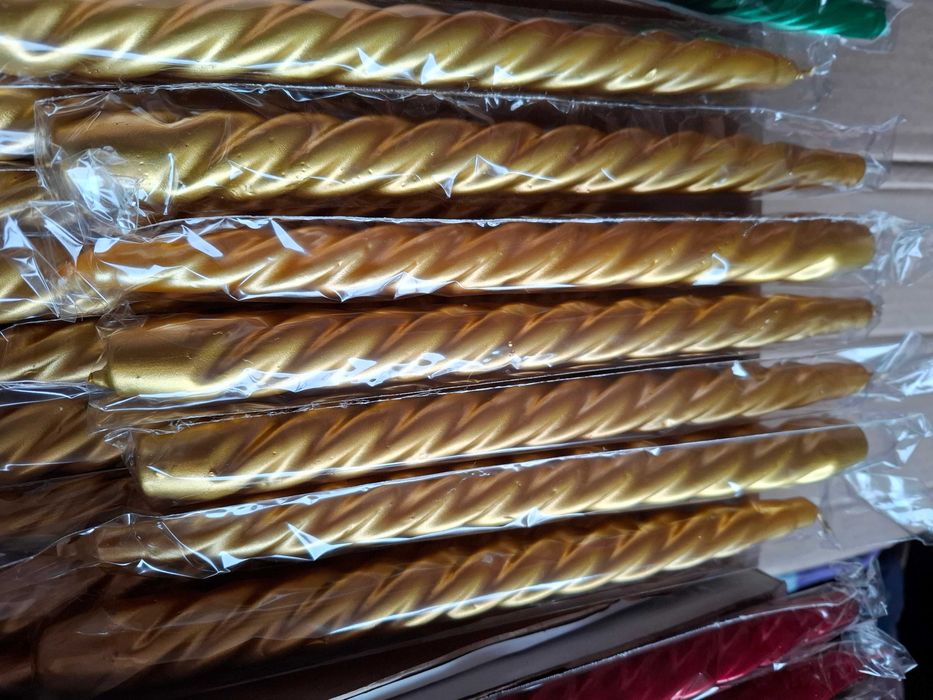 Свеча стеариновая в оболочке, зеленая,красная,золотая