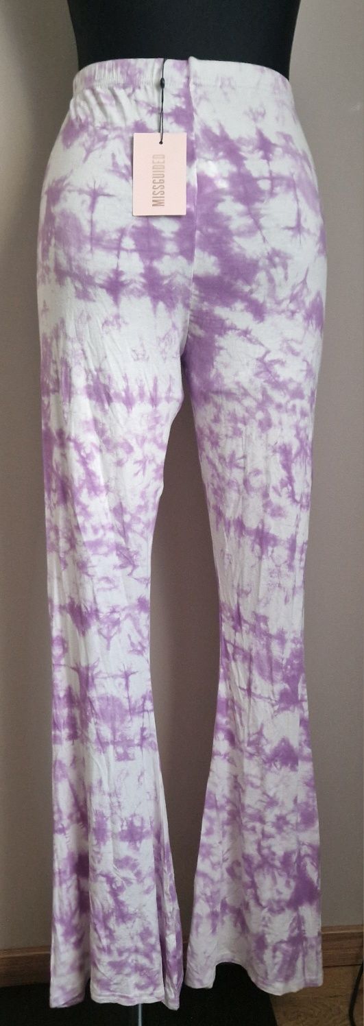 Nowe Spodnie legginsy   z rozszerzanymi nogawkami r.40 L