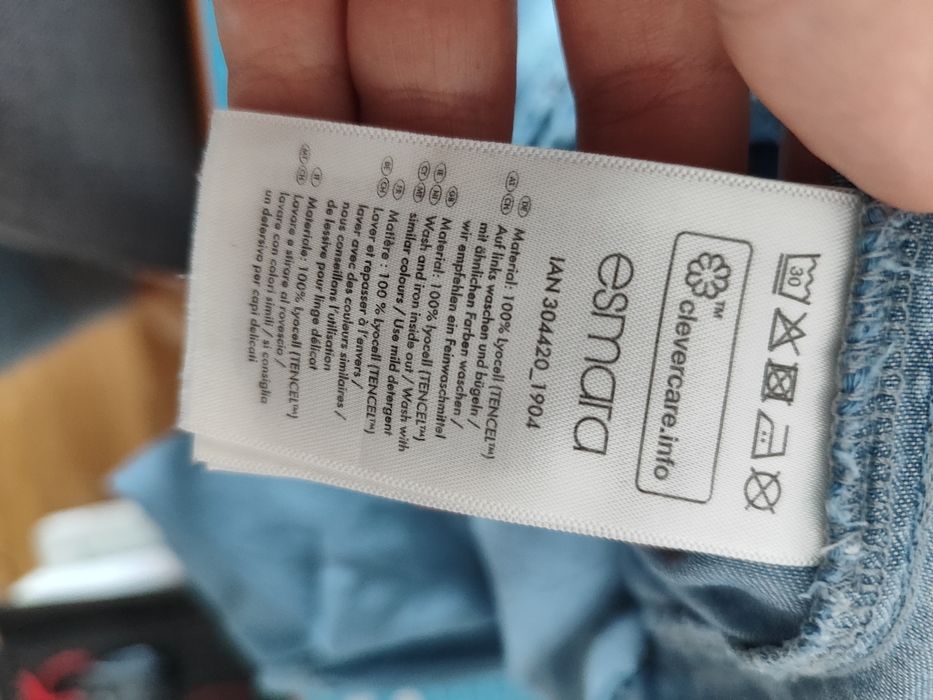 Jeansowa bluzka na długi rękaw zapinana na guziki