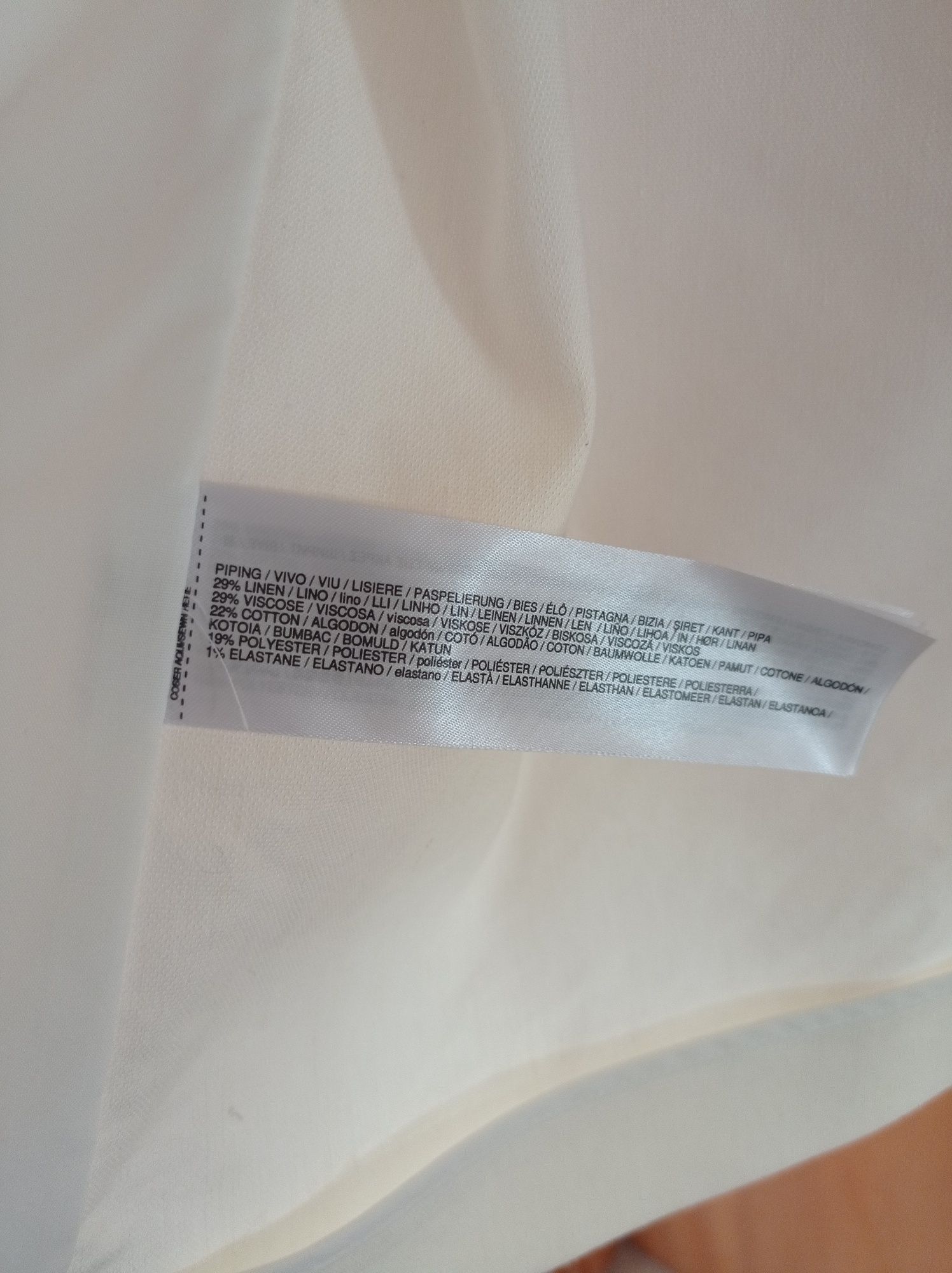 Casaco branco sujo Mango