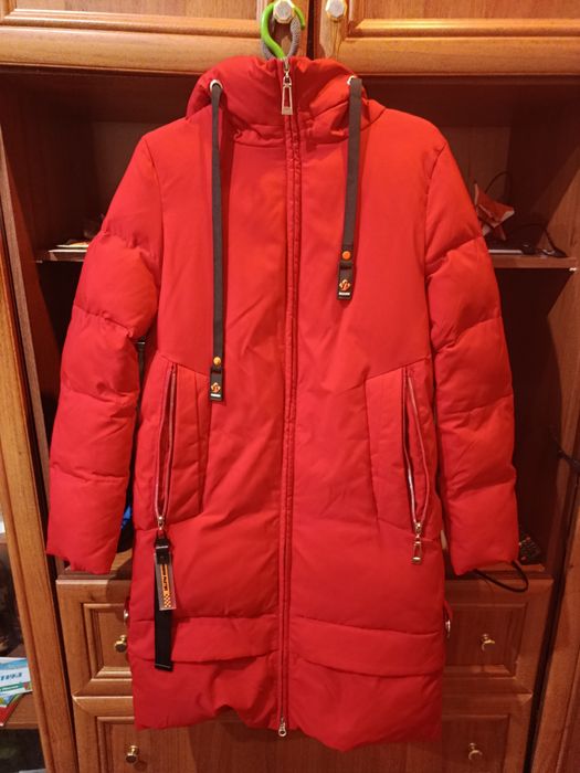 Продам пуховик жіночий,р.46-48.