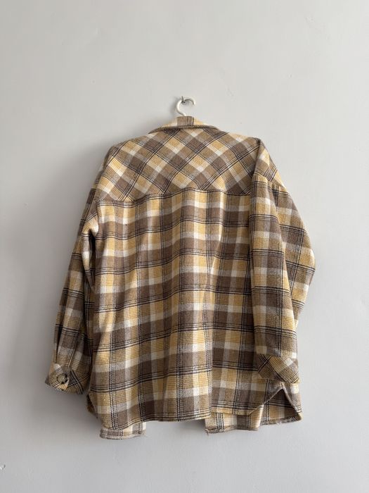 Жіноча сорочка в клітинку