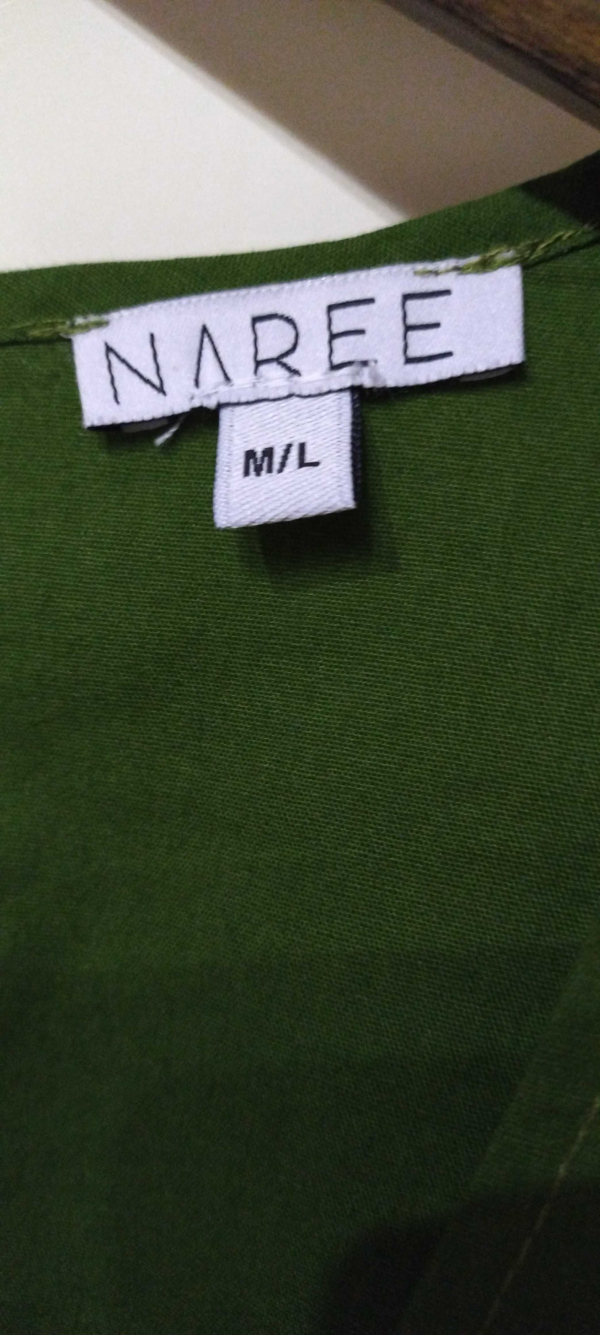Sukienka w kolorze butelkowej zieleni .