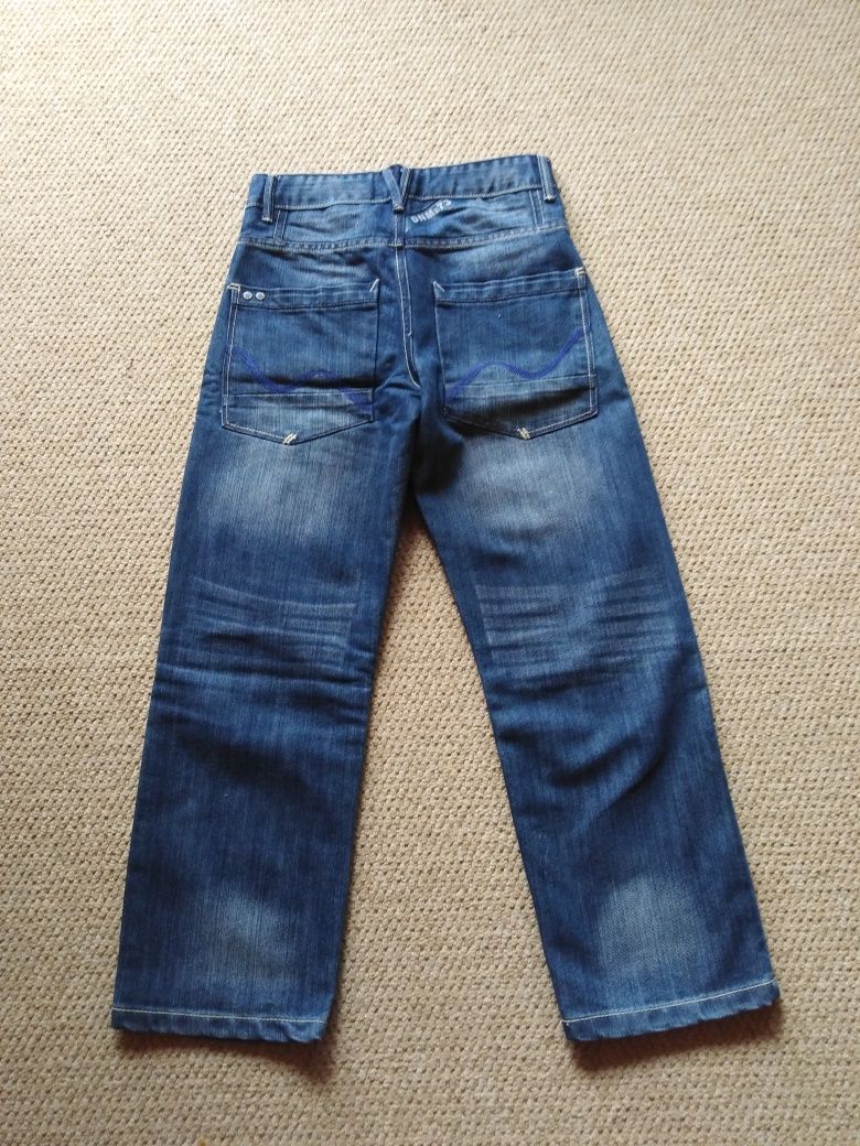 Spodnie dżinsy jak nowe na szczupłego chłopca r. 146-152 cm