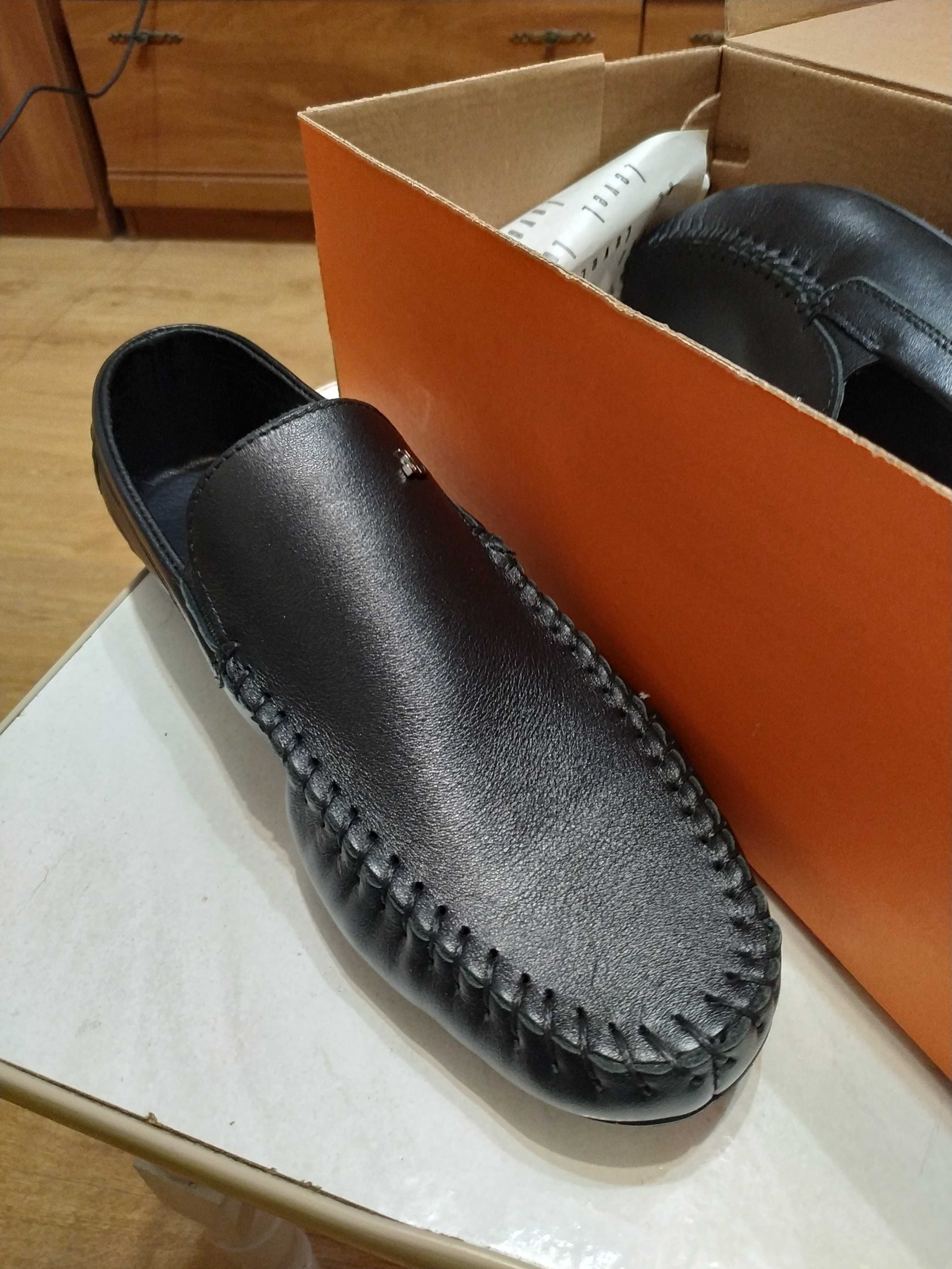 Продам новые кожаные мокасины