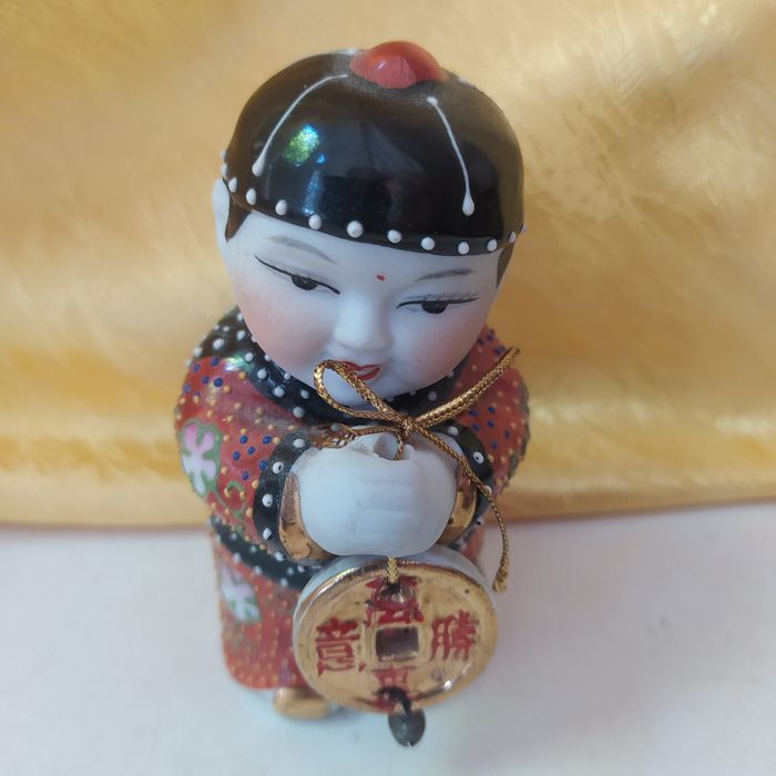 Продам статуетку китайця