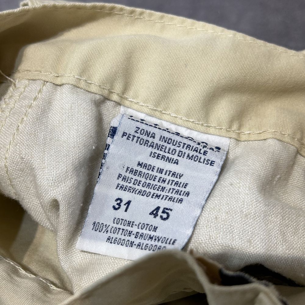 Spodnie chino versace jeans couture mini logo patch