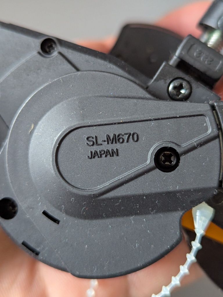Shimano SL M670 SLX Manetka dźwignia przerzutki 10 rz. prawa / obejma