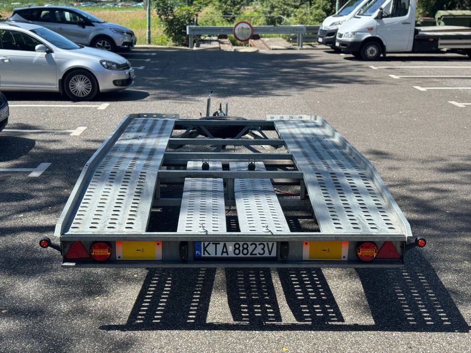 Wynajem laweta 4.5m przyczepa wypozyczalnia przyczepka Autolaweta