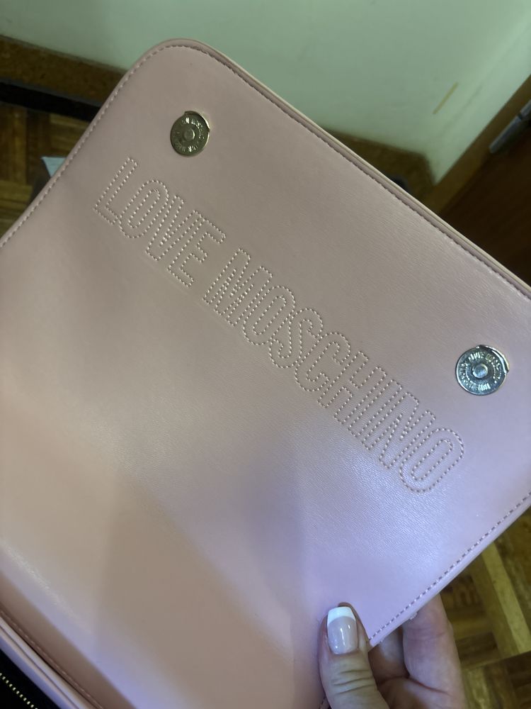 Mala rosa Guess tiracolo e ombro