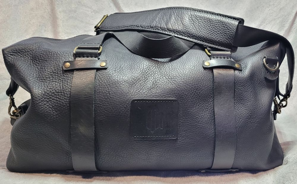 Дорожня шкіряна чорна сумка