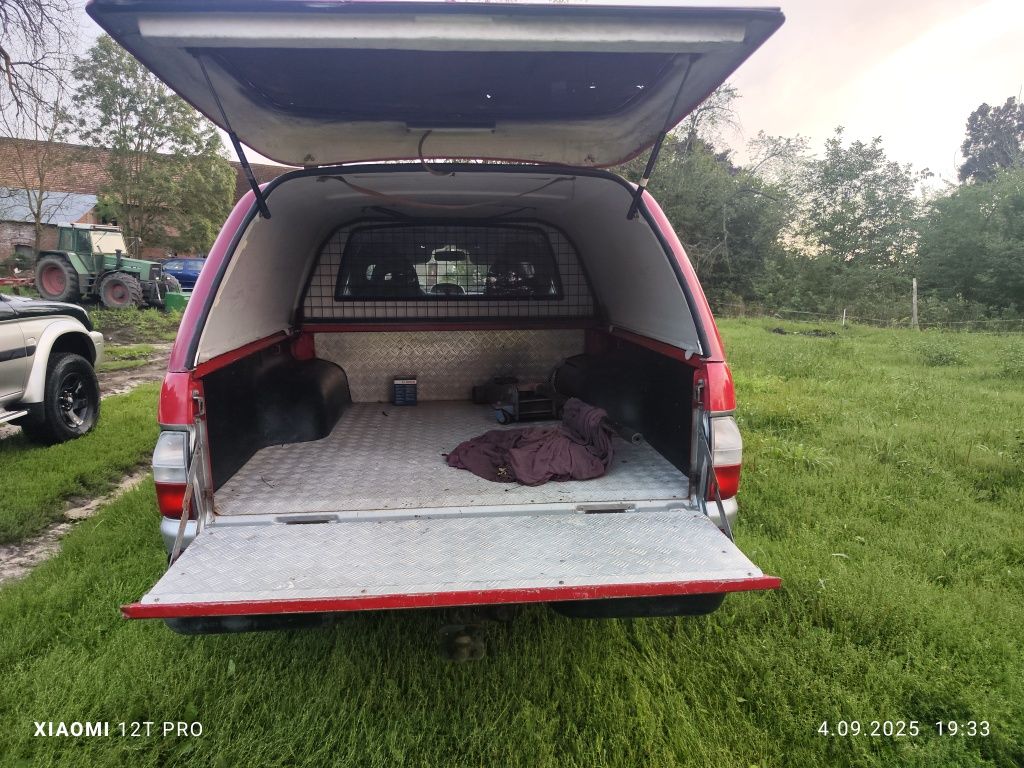 Mitsubishi L200 2.5 134 km 2004 rok przebieg 200000 km.