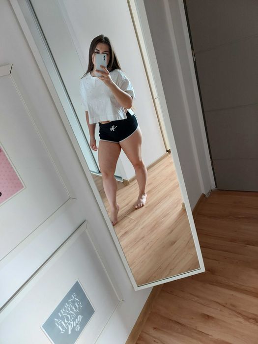 biała luźna koszulka L reserved gwiazdki star