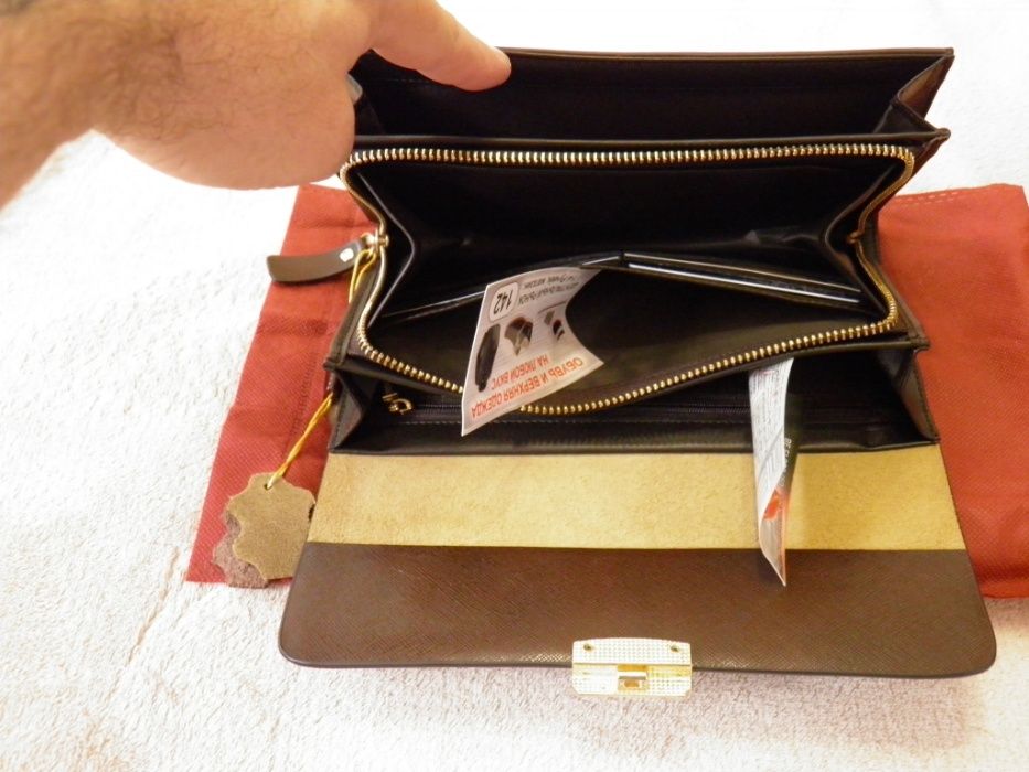 Барсетка - P.KUONE из воловьей кожи.