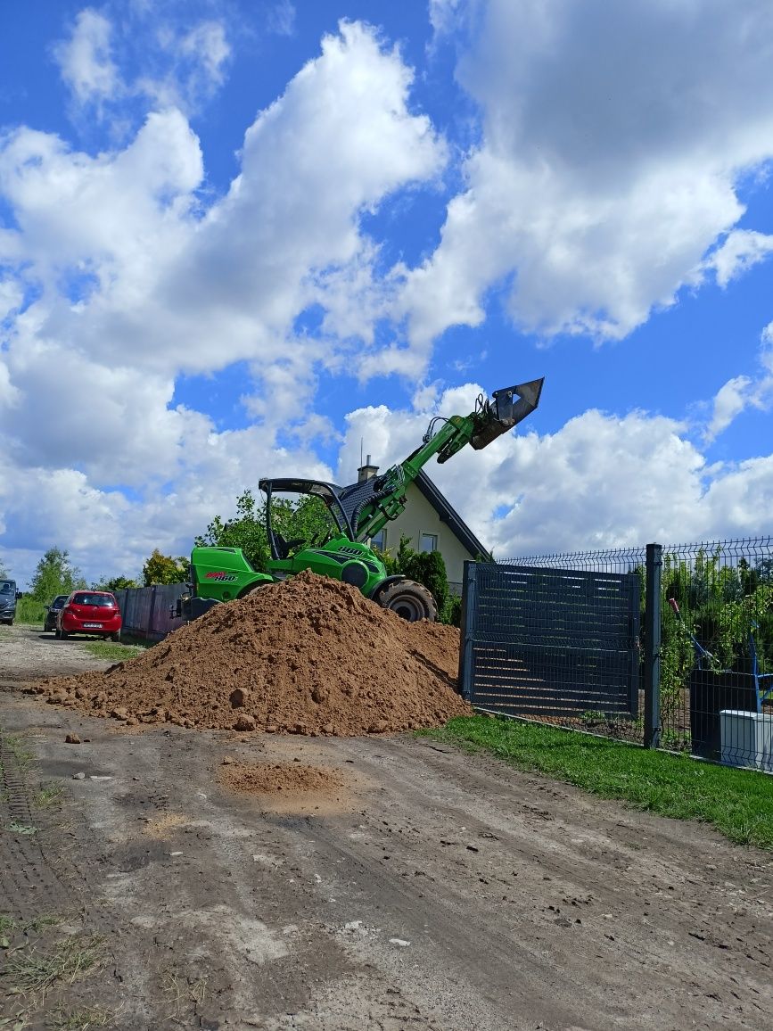 Usługi ładowarką Avant 860i ogrody tarasy podjazdy