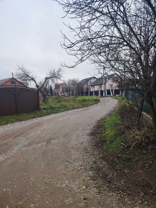 Продаж будинку з земельною ділянкою 15с