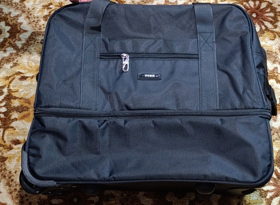 Дорожня сумка чорна 48x28x38/48 см