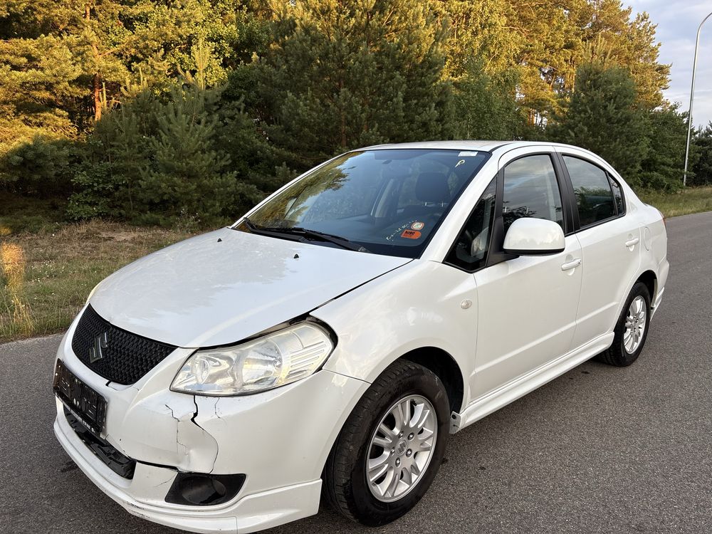 Suzuki sx4. Klimtronic biala perla