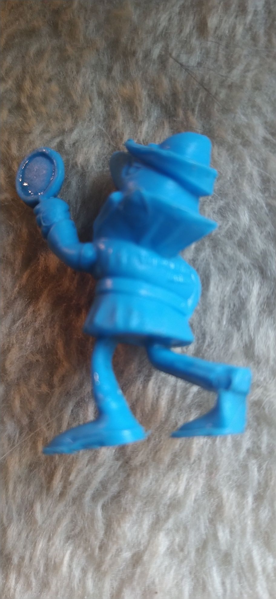 Boneco monocromático antigo