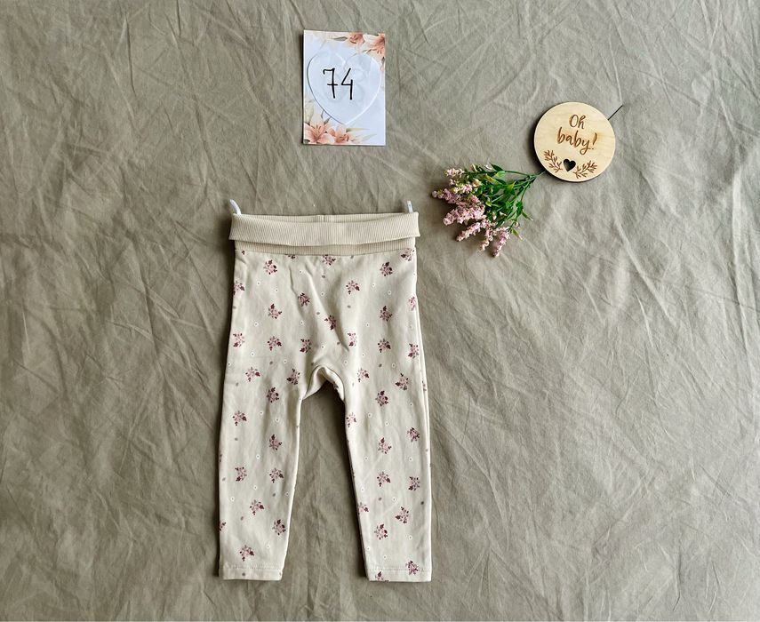 Wyprzedaż spodnie w kwiatki z meszkiem c&a 74/80