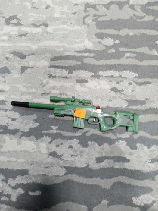 Дитячий автомат, що стріляє орбізами