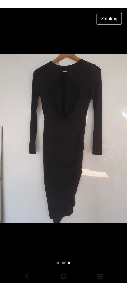 Czarna asymetryczna sukienka z dużym dekoltem