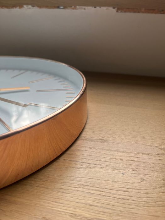 Zegar ścienny złoty miedź