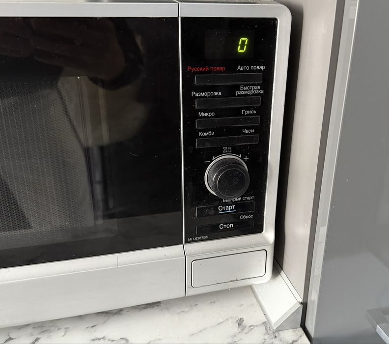 Мікрохвильова піч Panasonic NN-GD577M LG mh 6387bs