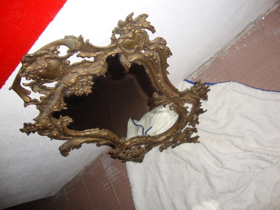 espelho com moldura em bronze