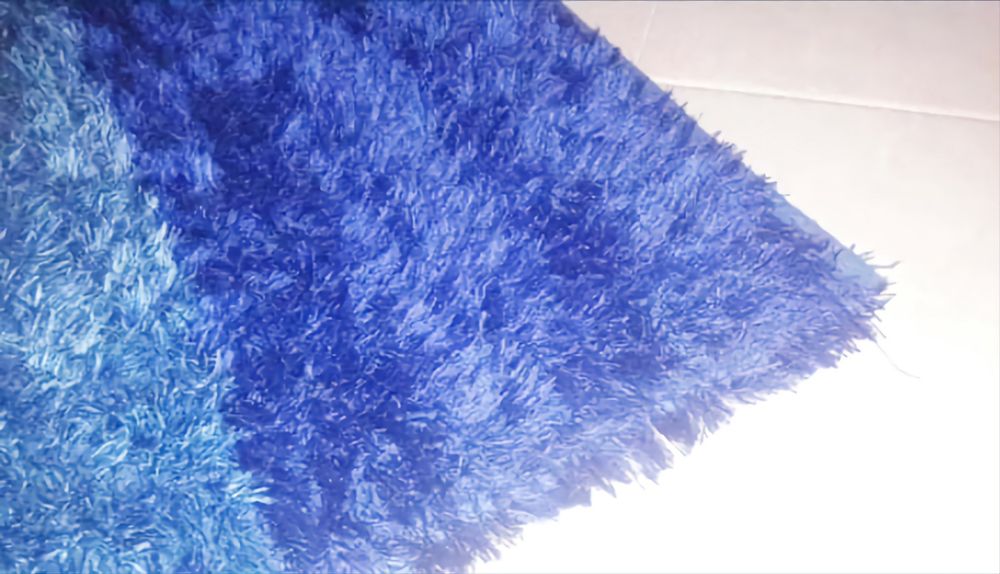 Tapete de sala pelo comprido